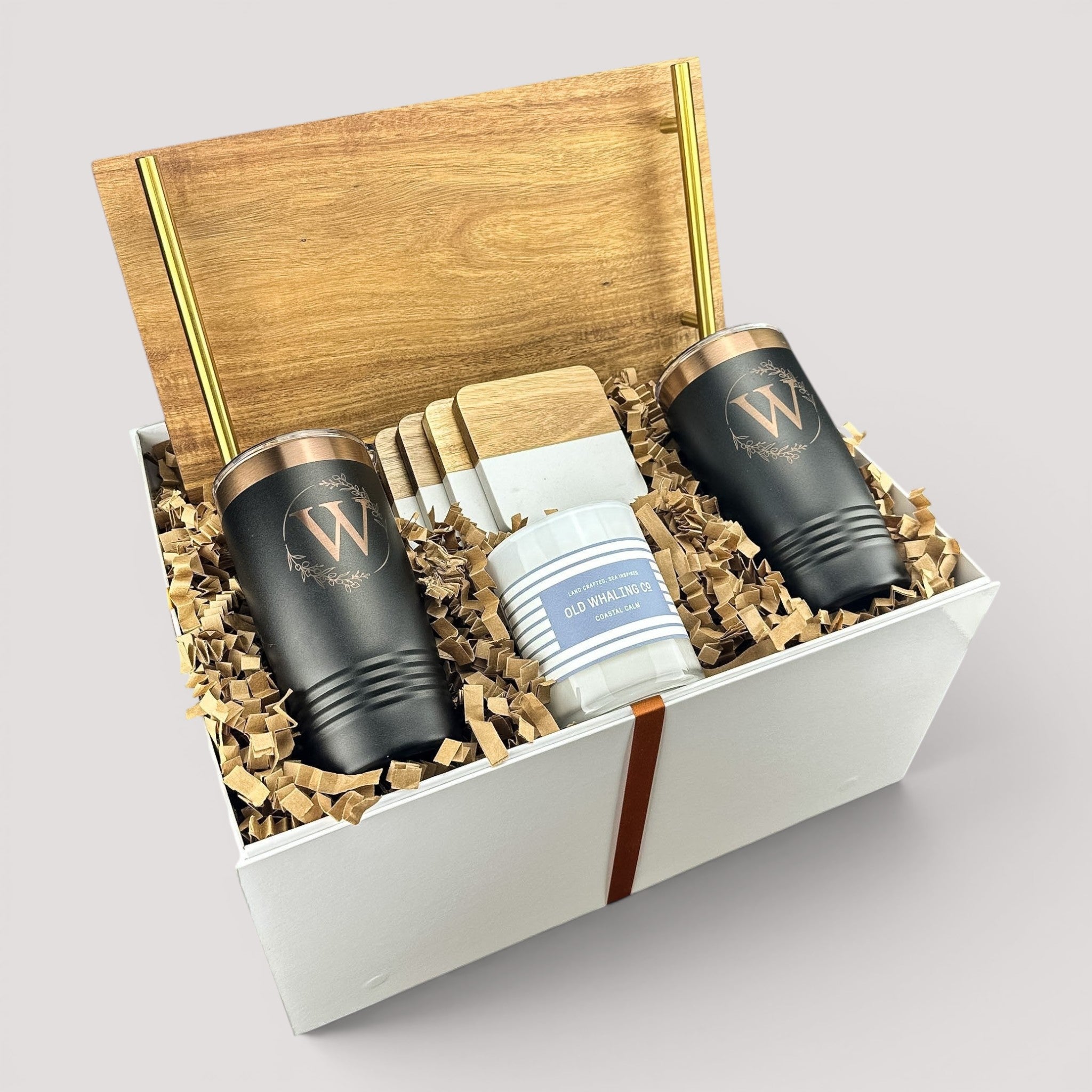Closing Day Gifts personalized acacia wood tray set with gold handles, engraved tumblers, coasters, and candle in box.