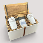 Closing Day Gifts personalized acacia wood tray gift set with engraved tumblers, marble coasters, and scented candle.