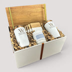Closing Day Gifts personalized acacia wood tray gift set with engraved tumblers, marble coasters, and scented candle.