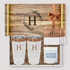 Closing Day Gifts personalized acacia wood tray set with gold handles, engraved tumblers, marble coasters, and candle.
