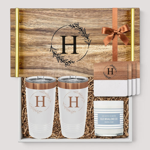 Closing Day Gifts personalized acacia wood tray set with gold handles, engraved tumblers, marble coasters, and candle.