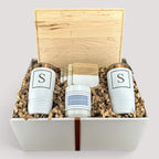 Closing Day Gifts personalized maple cutting board gift set with engraved tumblers, marble coasters, and candle.