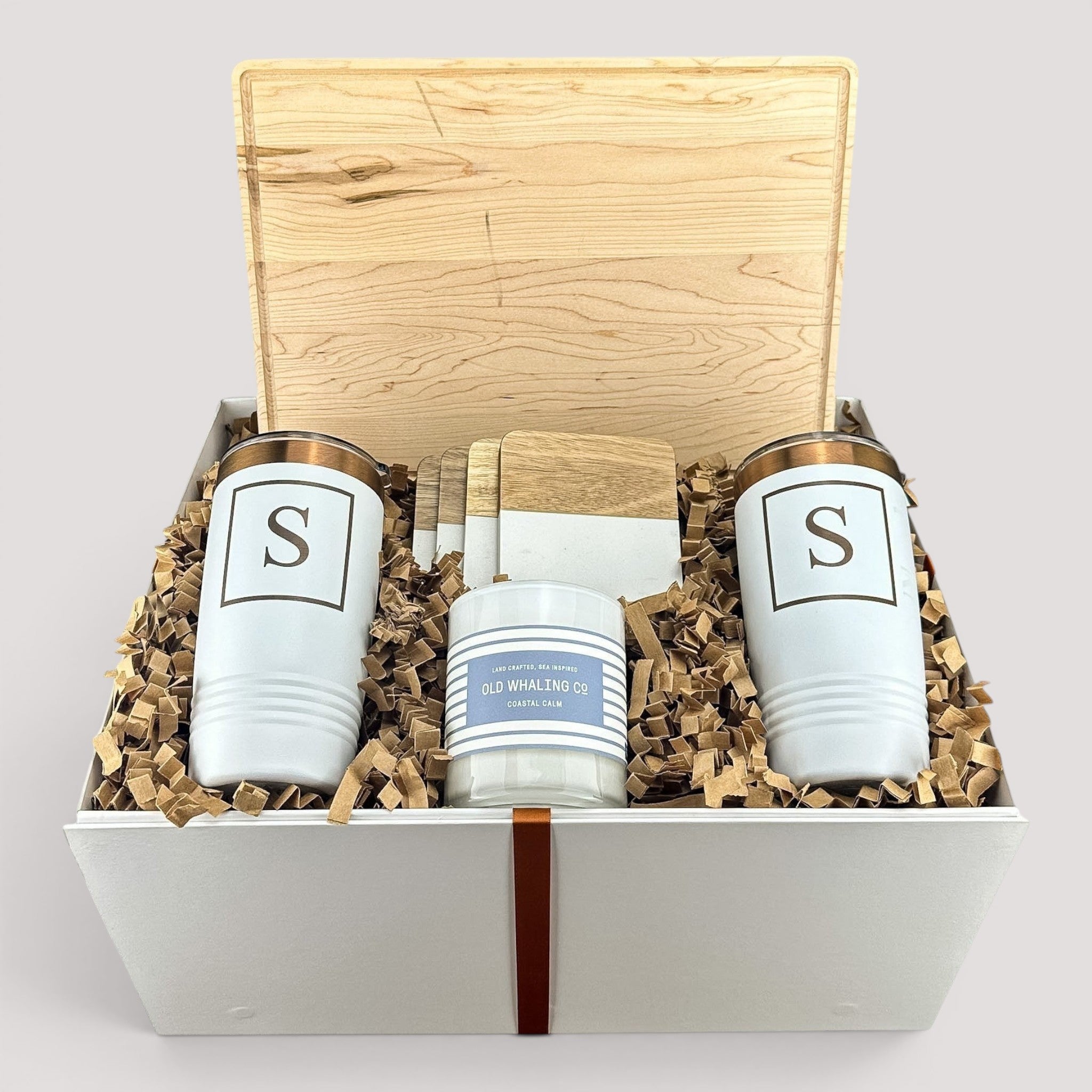 Closing Day Gifts personalized maple cutting board gift set with engraved tumblers, marble coasters, and candle.