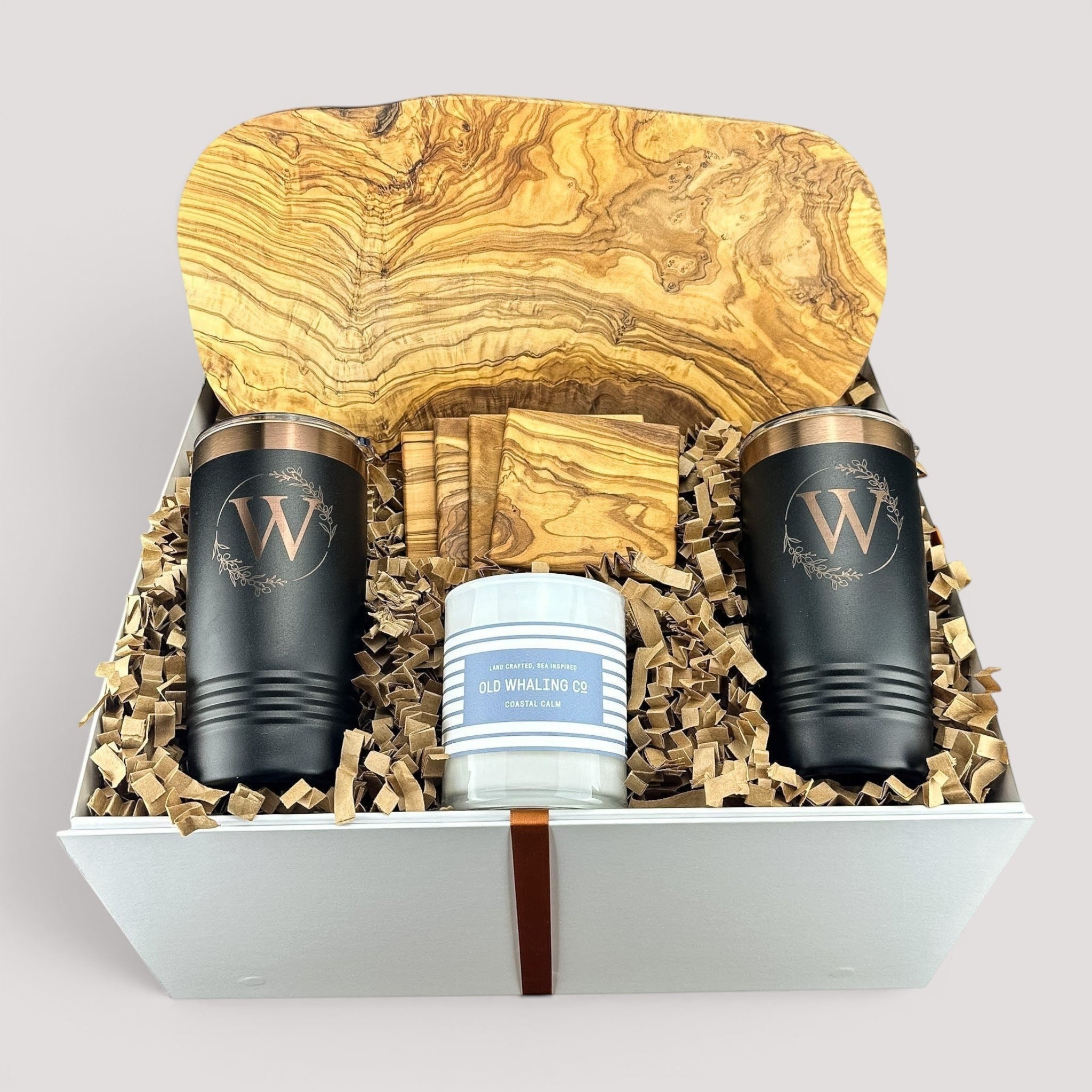 Closing Day Gifts personalized olive wood cutting board set with engraved tumblers, coasters, and Old Whaling Co candle.