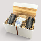 Closing Day Gifts personalized closing gift set with engraved tumblers, marble coasters, and candle in a keepsake box.