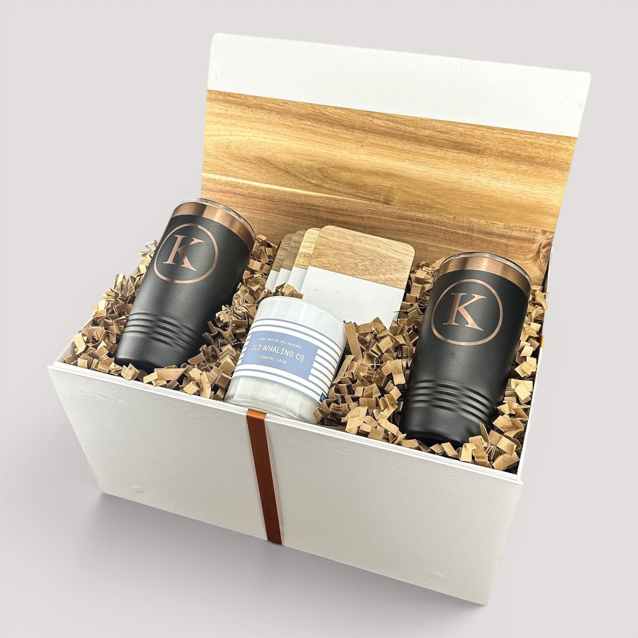 Closing Day Gifts personalized closing gift set with engraved tumblers, marble coasters, and candle in a keepsake box.
