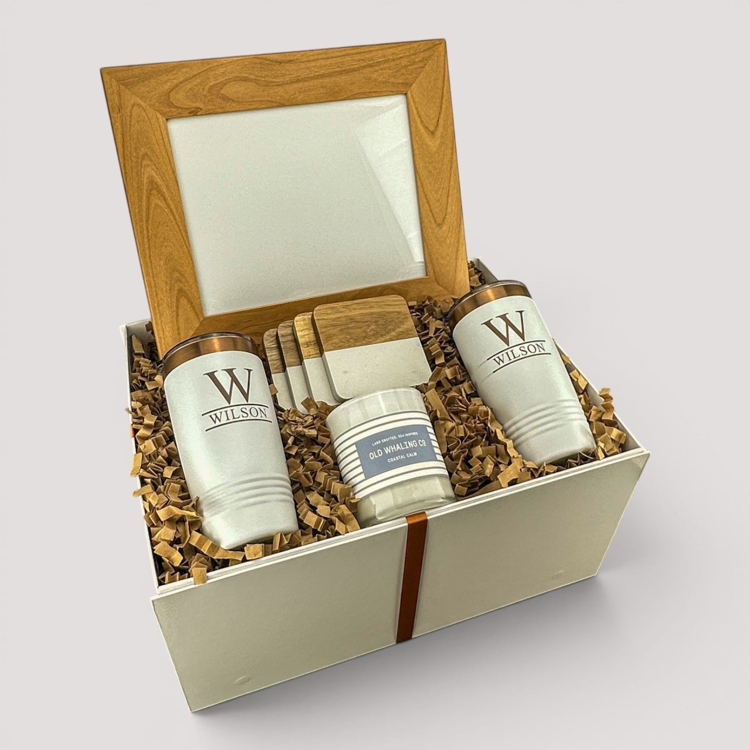 Closing Day Gifts personalized new home gift set with wood-framed print, engraved tumblers, coasters, and soy candle.