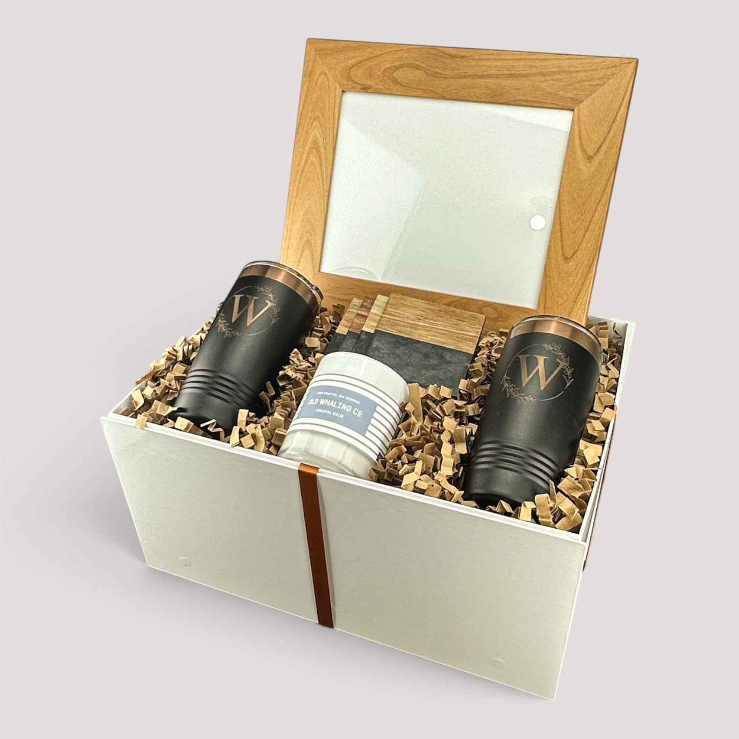 Closing Day Gifts personalized housewarming set with engraved tumblers, marble coasters, candle, and framed art in a box