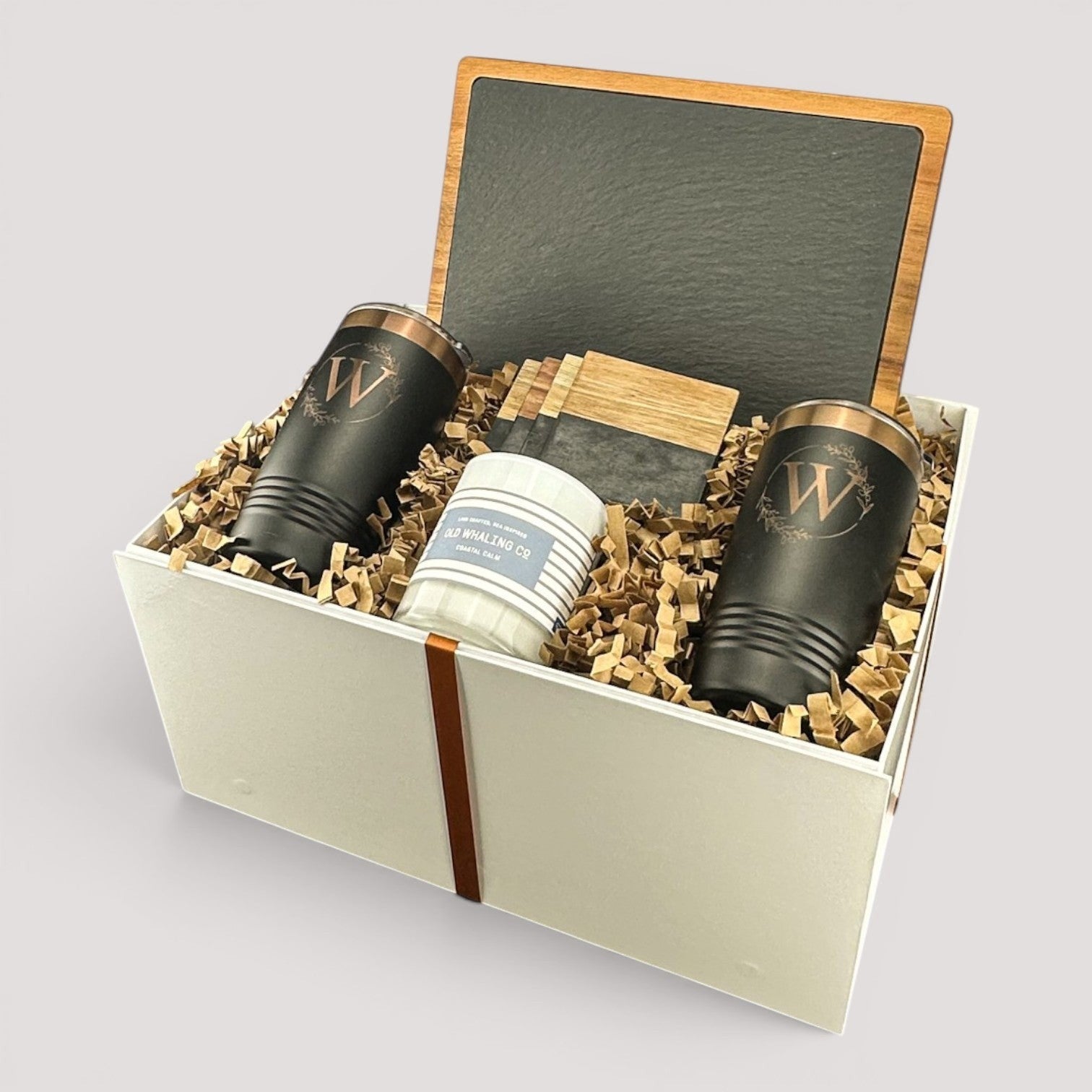 Closing Day Gifts personalized housewarming set with slate board, engraved tumblers, marble coasters, and soy candle.