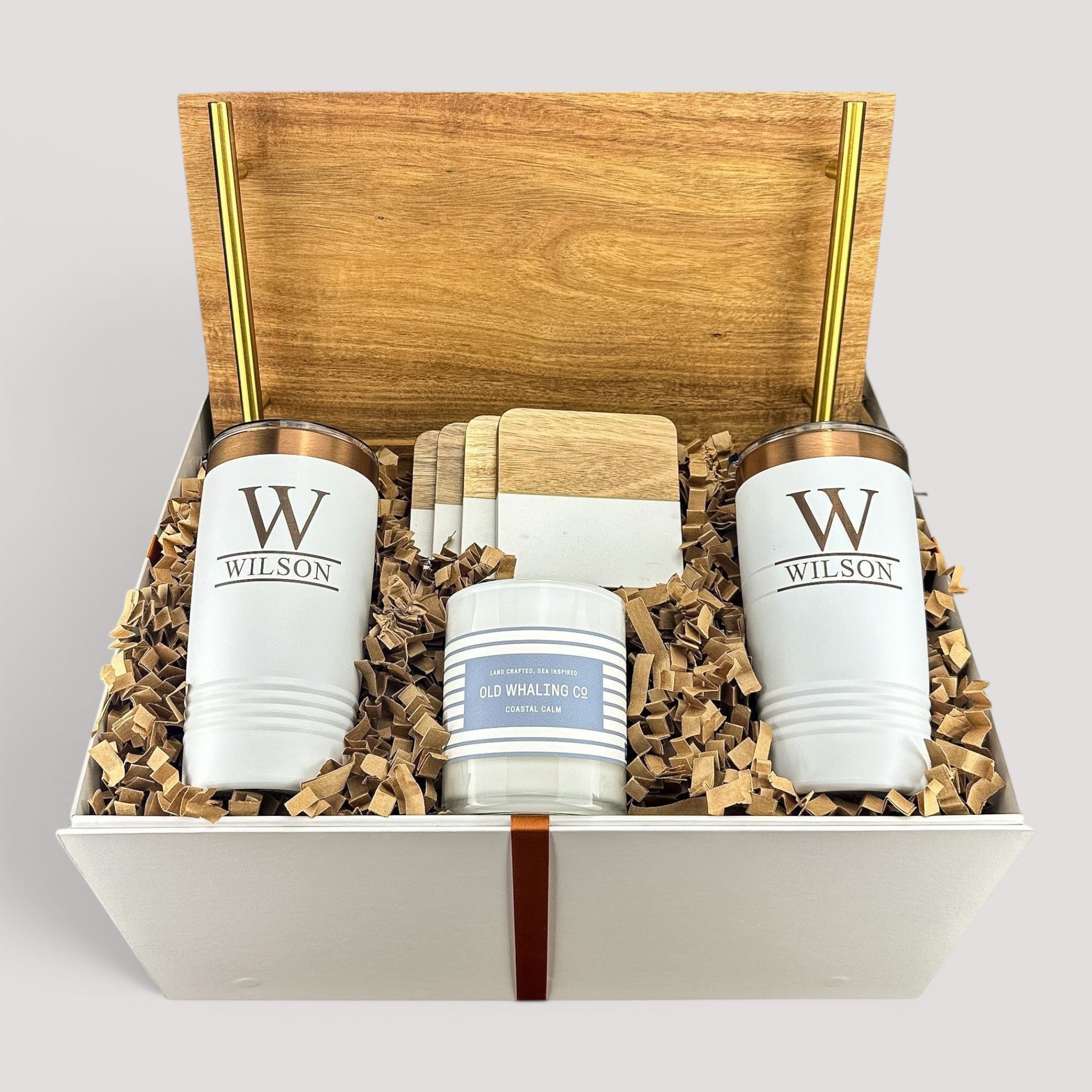 Closing Day Gifts personalized housewarming set with acacia tray, engraved white tumblers, marble coasters, and candle.