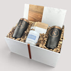 Closing Day Gifts personalized housewarming set with marble board, engraved tumblers, coasters, and candle in a gift box