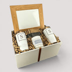 Closing Day Gifts personalized housewarming set with framed watercolor print, engraved tumblers, coasters, and candle.