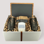 Closing Day Gifts personalized housewarming set with slate cheese board, two tumblers, coasters, and soy candle.