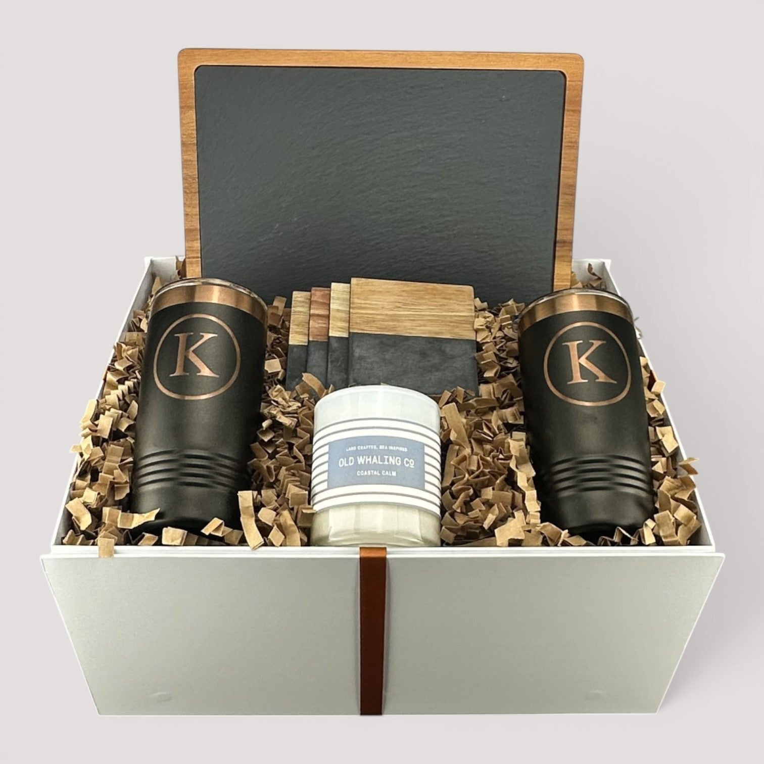 Closing Day Gifts personalized housewarming set with slate cheese board, two tumblers, coasters, and soy candle.