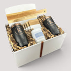 Closing Day Gifts personalized housewarming set with marble board, black tumblers, coasters, and candle in a gift box.