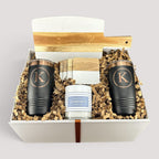 Closing Day Gifts personalized housewarming set with marble serving board, engraved tumblers, coasters, and candle.