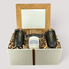 Closing Day Gifts personalized housewarming set with engraved tumblers, marble coasters, candle, and framed print.