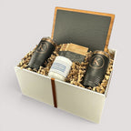 Closing Day Gifts personalized housewarming set with slate cheese board, engraved tumblers, coasters, and soy candle.