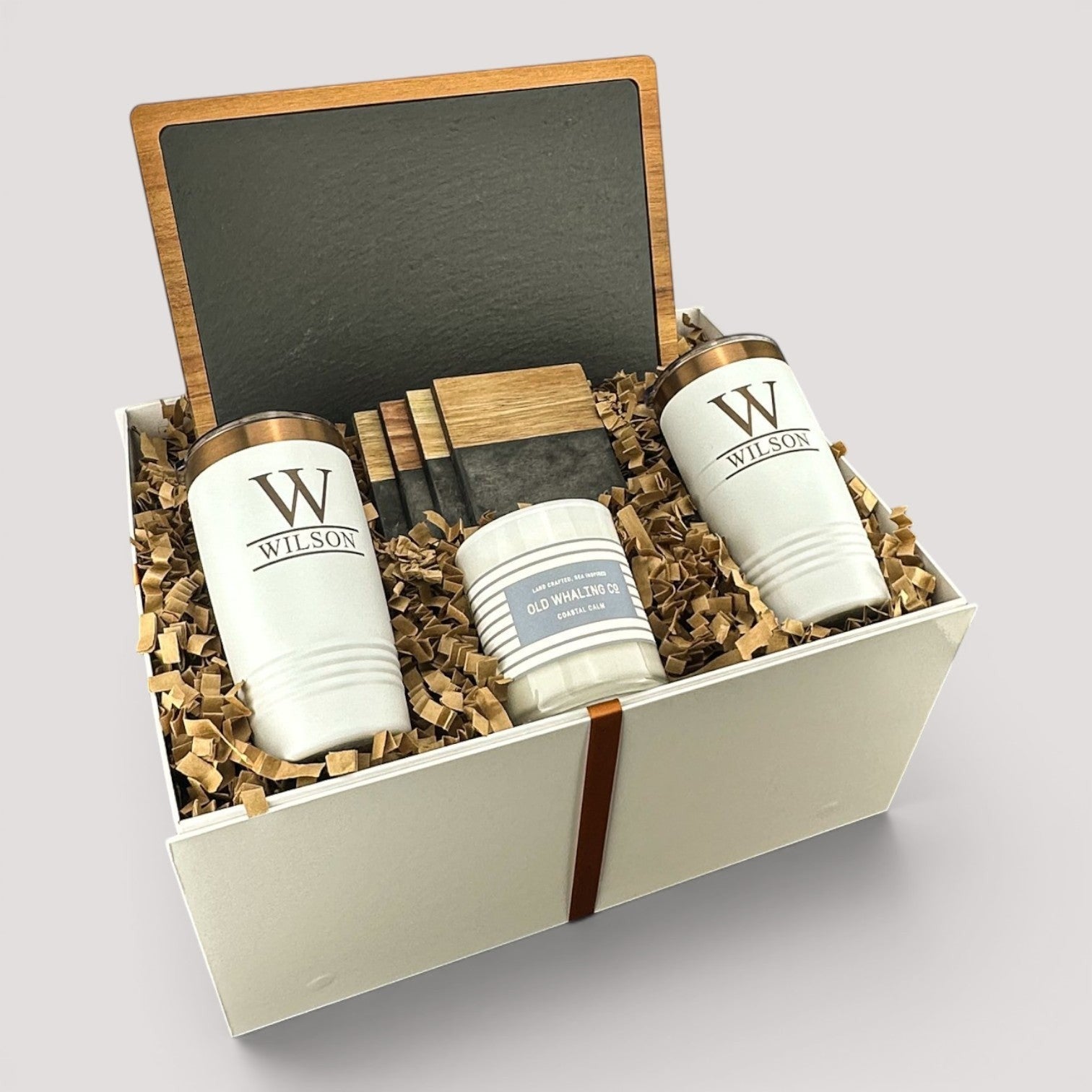Closing Day Gifts personalized housewarming set with slate board, engraved tumblers, marble coasters, and soy candle.