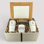 Closing Day Gifts personalized housewarming set with framed print, engraved tumblers, marble coasters, and soy candle.
