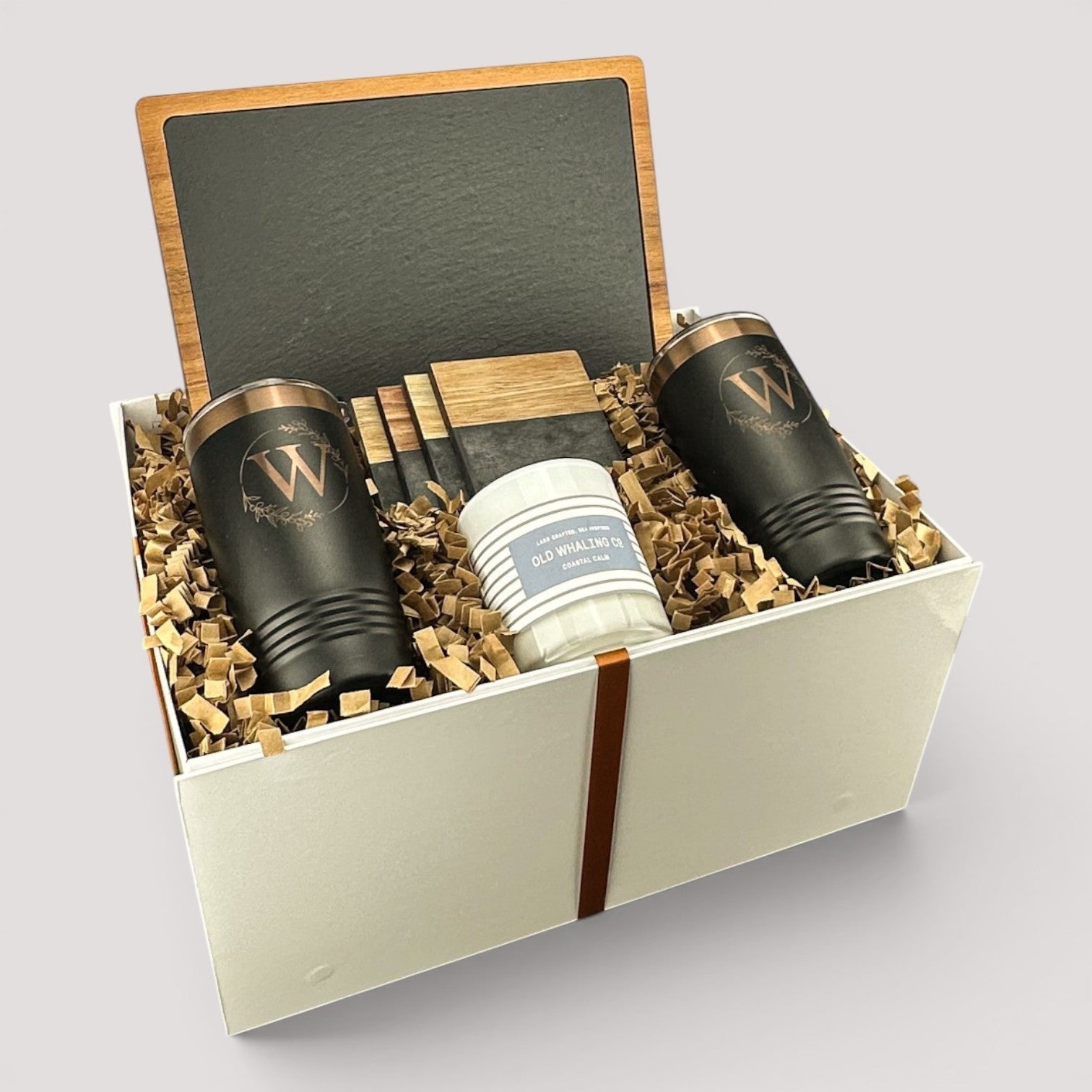 Closing Day Gifts personalized housewarming set with slate board, engraved tumblers, marble coasters, and soy candle.