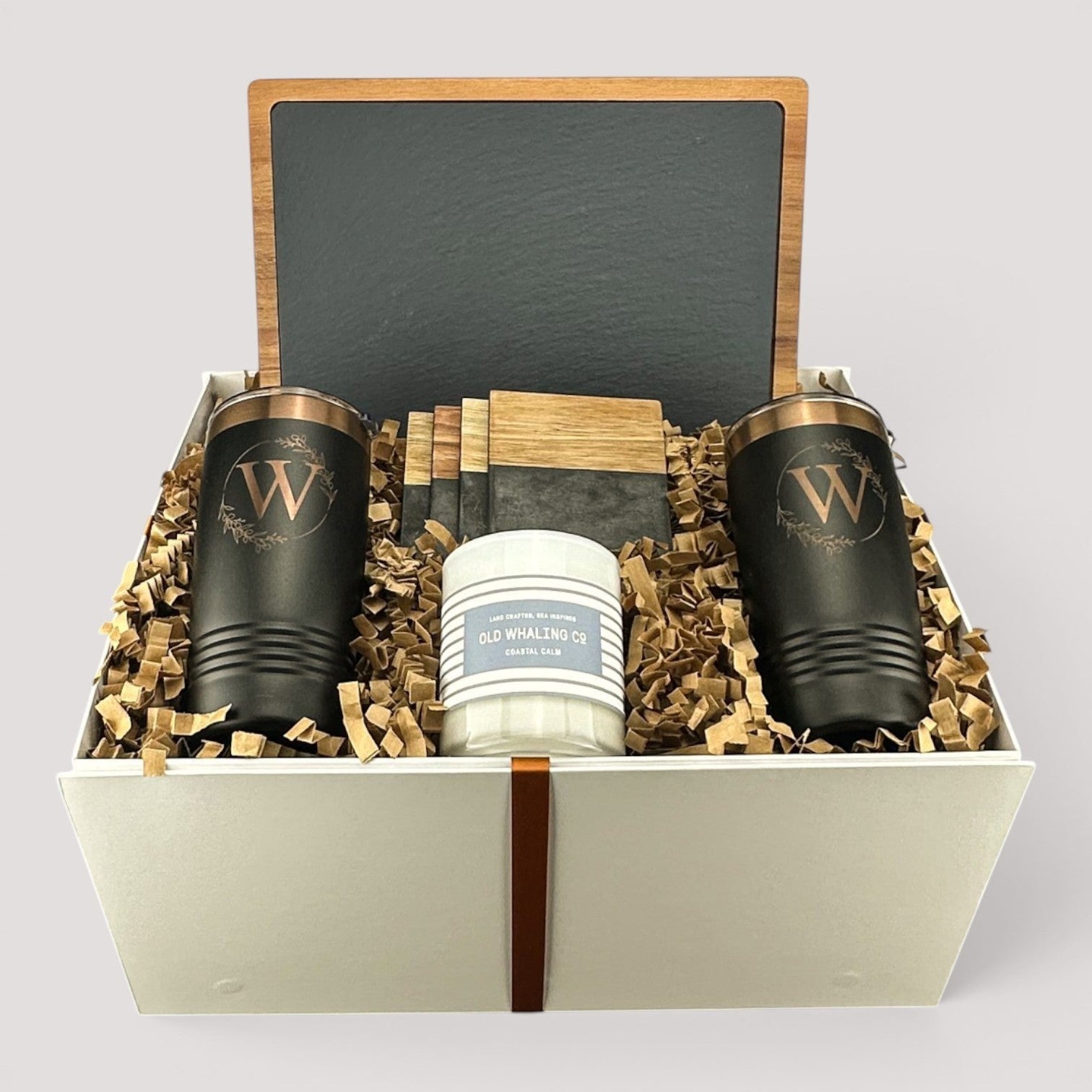 Closing Day Gifts personalized housewarming set with slate board, engraved tumblers, marble coasters, and soy candle.