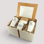 Closing Day Gifts personalized housewarming set with engraved tumblers, marble coasters, candle, and framed art.