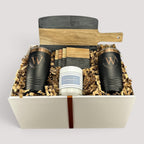 Closing Day Gifts personalized serving board set with black marble, acacia wood, tumblers, coasters, and candle.