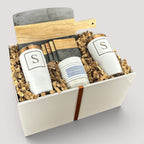 Closing Day Gifts personalized serving board, tumblers, coasters, and candle set in a keepsake gift box.