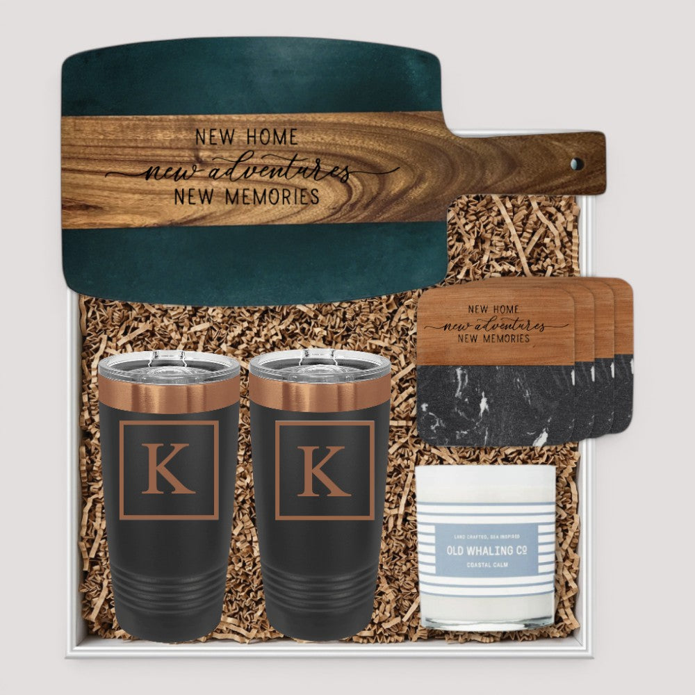 Closing Day Gifts personalized serving board, tumblers, coasters, and candle set in a keepsake gift box.