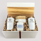Closing Day Gifts personalized serving board set with engraved tumblers, marble coasters, and candle in a gift box.