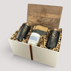 Closing Day Gifts personalized walnut cutting board set with engraved tumblers, marble coasters, and a scented candle.