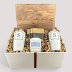 Closing Day Gifts personalized walnut cutting board set with engraved tumblers, marble coasters, and scented candle.